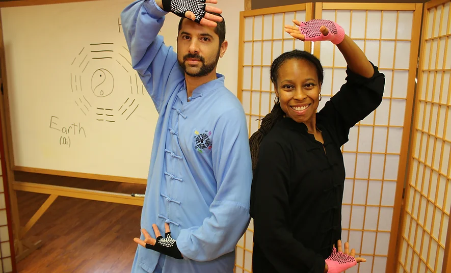 Yadi and Joi doing qigong at Charlotte Acu Bodywork