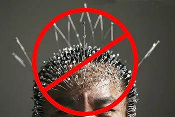 Man with too many needles in his head Charlotte Acu Bodywork